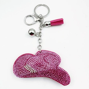 Pink rhinestone cowboy hat keychain with silver lobster clasp and decorative tassel