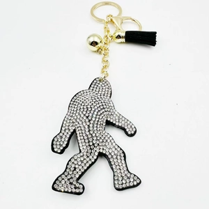 Sparkling rhinestone Bigfoot keychain with black tassel and golden bell for bag charms