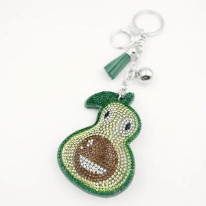 Sparkling crystal avocado keychain with green rhinestone details and leather tassel