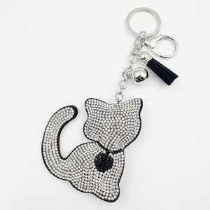 Crystal studded cat keychain with rhinestone body and black leather tassel charm