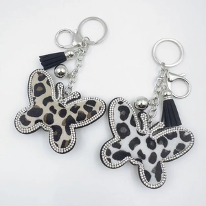 Leopard Print Butterfly Keychain Rhinestone Inlaid Faux Fur Bag Charm With Black Leather Tassel For Women Daily Accessories