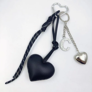 Black PU leather heart keychain with rhinestone letter C charm and silver metal accents