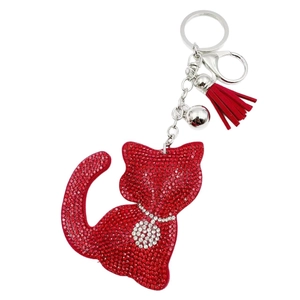 Sparkling red rhinestone cat keychain with velvet tassel and silver bell accessory