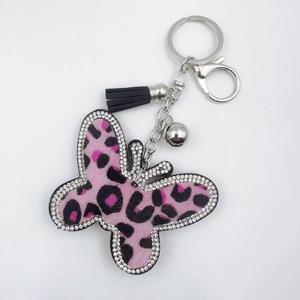 Pink leopard print butterfly keychain with sparkling rhinestones and black fringe tassel