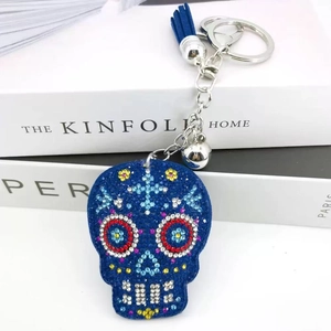 Blue skull keychain with colorful rhinestones and tassel for Halloween bag decor