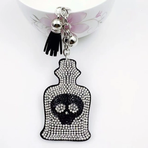 Gothic rhinestone skull keychain with black tassel and potion bottle pendant decoration