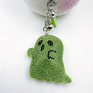 Porte-clés fantôme vert avec cristaux étincelants et pompon pour sacs d'Halloween