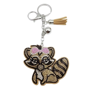 Porte-clés raton laveur en strass brillant avec pompon en daim marron et clochette argentée