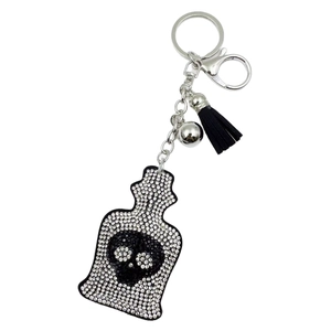 Skull perfume bottle keychain with white rhinestones, black tassel, and lobster clasp