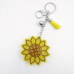 Porte-Clés Tournesol Créatif en Strass Avec Pompon et Clochette Alliage Étincelant Fleur Pendentif de Sac Femme Accessoires
