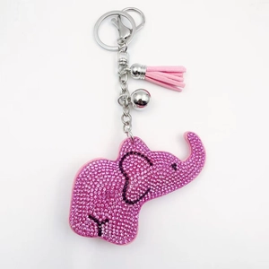 Porte-clés éléphant en strass rose avec pompon en daim et fermoir mousqueton