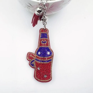 American style rhinestone wine bottle keychain with red tassel and silver bell