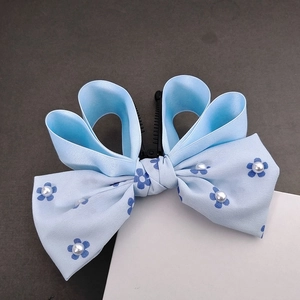 Elegant blue bow banana hair clip with floral ribbon and pearls for women