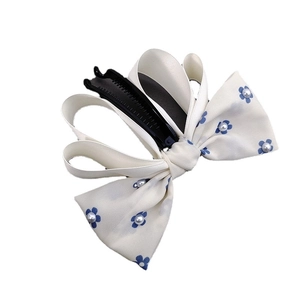 Elegant white bow banana hair clip with blue flower print and pearl accents for women