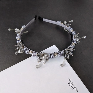 Elegant grey pearl and crystal floral headband with shimmering beads in a vintage style