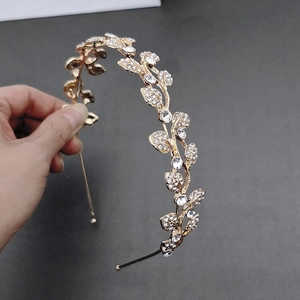 Exquisite golden bridal crown with crystal leaves and vines for wedding parties
