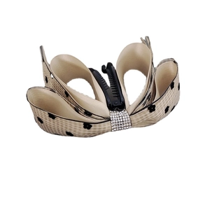 Fashionable champagne gold bow banana clip with rhinestones and black floral pattern