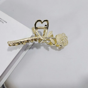 Elegant gold metal rose hair claw clip with pearls and heart handle for women hairstyle