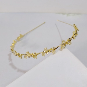 Elegant gold headband with opal beads and rhinestones in a vintage floral design