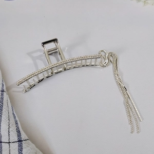 Elegant silver metal hair claw clip with sparkling tassel chains and rhinestones