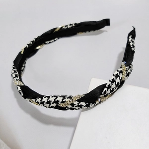 Vintage houndstooth knot headband with black satin fabric and sparkling gold rhinestones