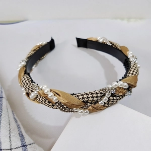 Elegant houndstooth braided headband with white pearls and sparkling rhinestones