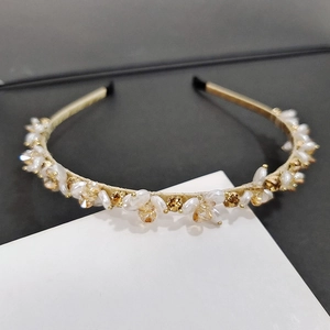 Elegant gold metal headband with white pearls and amber crystals for a vintage floral look