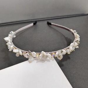 Elegant floral headband with white pearls and sparkling rhinestones for women