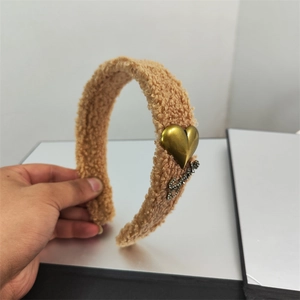Light brown lamb wool headband with golden heart and rhinestone letter decorations
