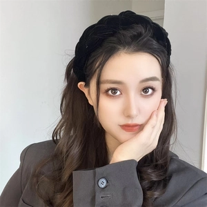 Elegant black velvet braided headband for women designed to create a high-crown hair look