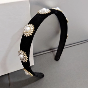 Elegant black velvet headband with sunflower pearl and rhinestone embellishments
