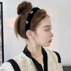 Elegant black velvet headband for women with golden heart and circular metal charms