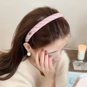 Pink tweed woven headband with a vintage gold oval emblem accent for women