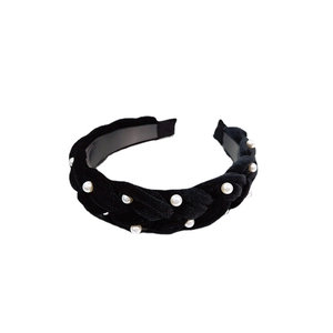 Elegant black velvet braided headband with white pearls for a high-crown stylish look