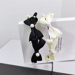 Elegant French style pearl bow headbands in classic black and creamy beige satin fabric