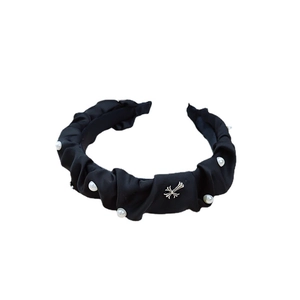 Elegant black satin pleated headband with white pearls and silver cross charm detail