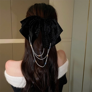 Elegant large black velvet bow hair clip with sparkling rhinestone fringe for women