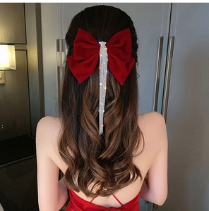 Elegant red velvet bow hair clip with sparkling diamond tassels for wedding hair styling