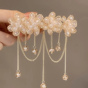 Elegant floral tassel hair clip with champagne beads and golden chain fringe accents