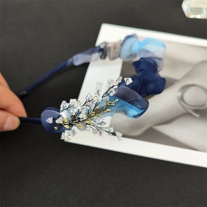 Elegant navy blue organza headband with sparkling crystals and golden branch accents