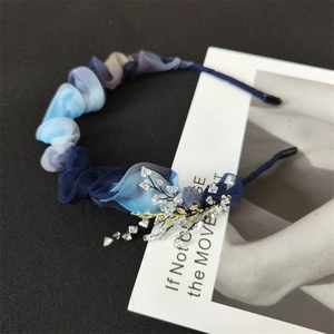 Blue gradient pleated headband with crystal wire detailing and organza fabric