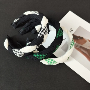Detail of twisted sponge headbands with classic houndstooth pattern in assorted colors