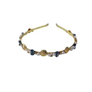 Elegant gold headband with white pearls, blue crystals and golden sea shells
