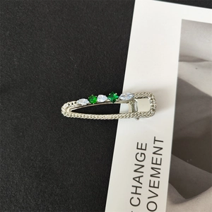 Elegant emerald green crystal hair clip with silver metal chain border for women