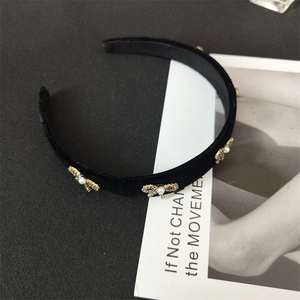 Elegant black velvet wide headband with gold butterfly bows and pearls for women