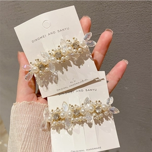 Floral crystal tassel hair clip with white pearls and sparkling rhinestones for women