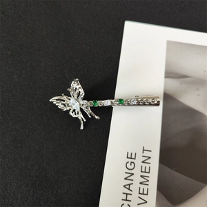 Silver butterfly hair clip with emerald green and white zircons in a vintage镂空 style