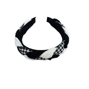 Twisted houndstooth and solid black fabric headband with elegant knit texture