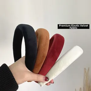 Close-up of premium elastic velvet padded headbands in black, brown, red, and cream white