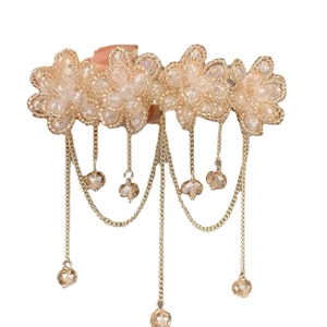 Champagne gold flower hair clip with multi-layer crystal fringe tassels on white background
